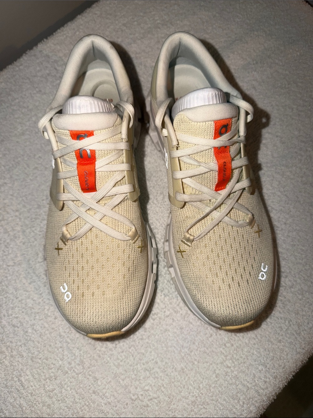 On Running Women's Sneakers in Cream with Orange Accents